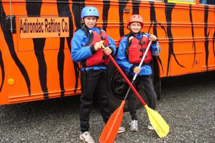Boys wearing whitewater gear