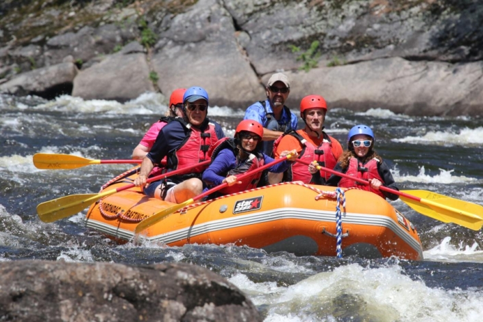 Raft entering a rapid