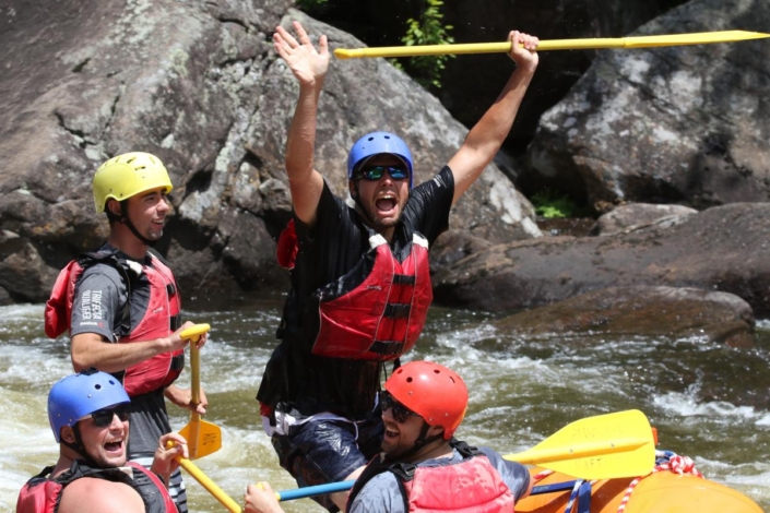 Rafters standing up in the boat